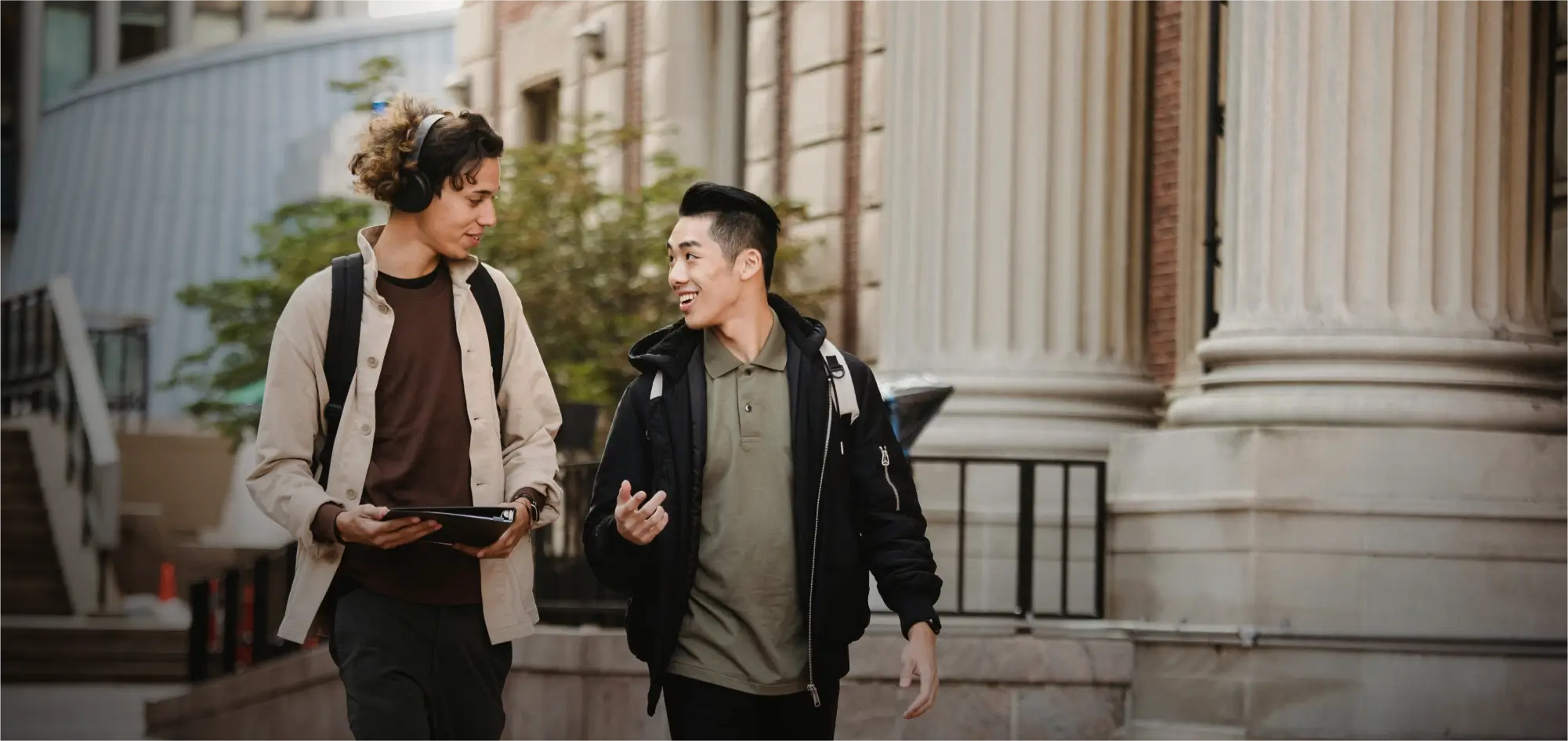 Students walking outdoors on a university campus.